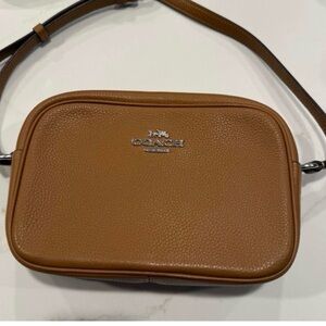 Never used coach purse bought for $200 great condition!